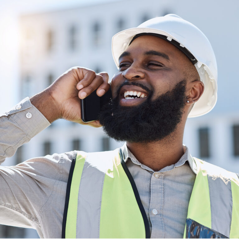 African engineer man, phone call and city with smile, thinking and listening for networking, buildi.